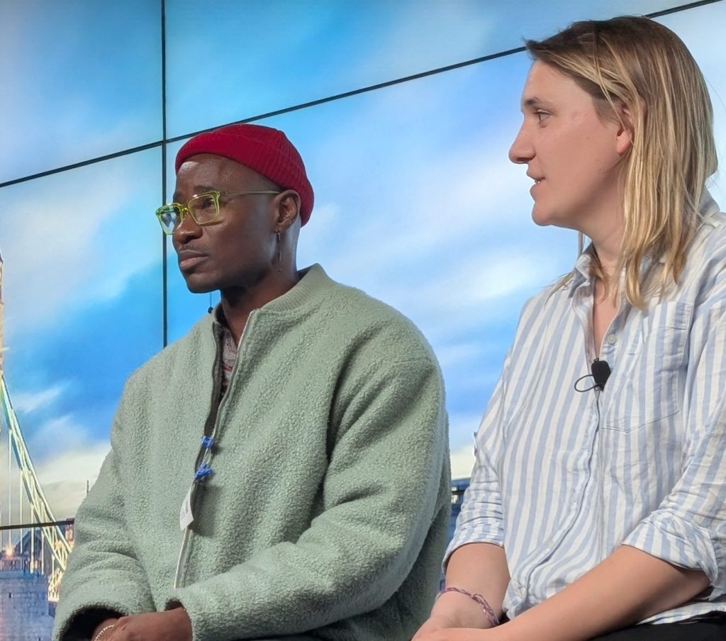 Bisi Alimi and Hannah Graf on stage at Pride Wide's Create Hope event in 2025